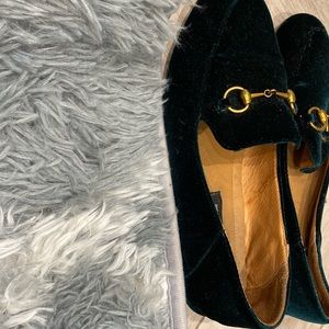 Crushed velvet green buckle loafer.